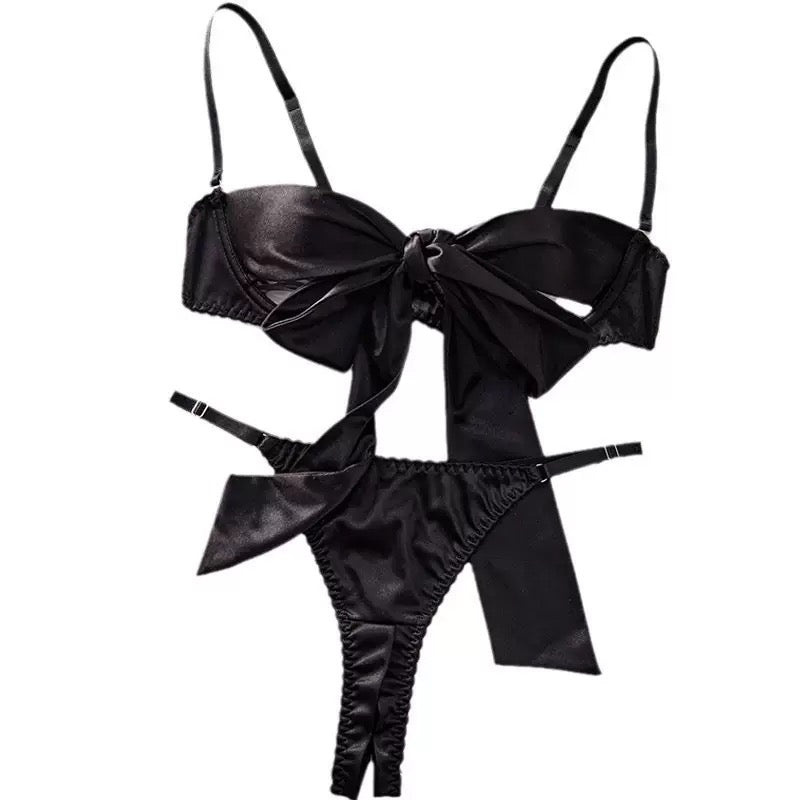 black bow lingerie set product white background flat lay