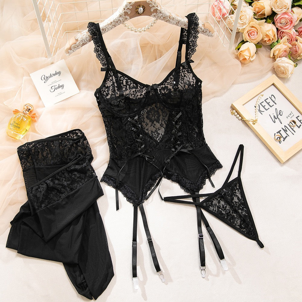 black lace lingerie set flat lay front view bra thong and thigh high stockings