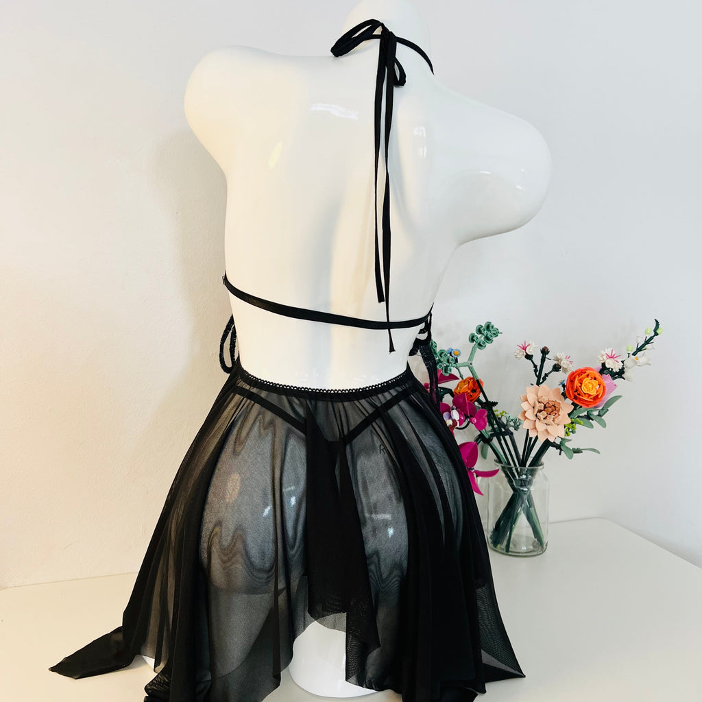 black lace sleep dress back view highlighting thong style and smooth silhouette
