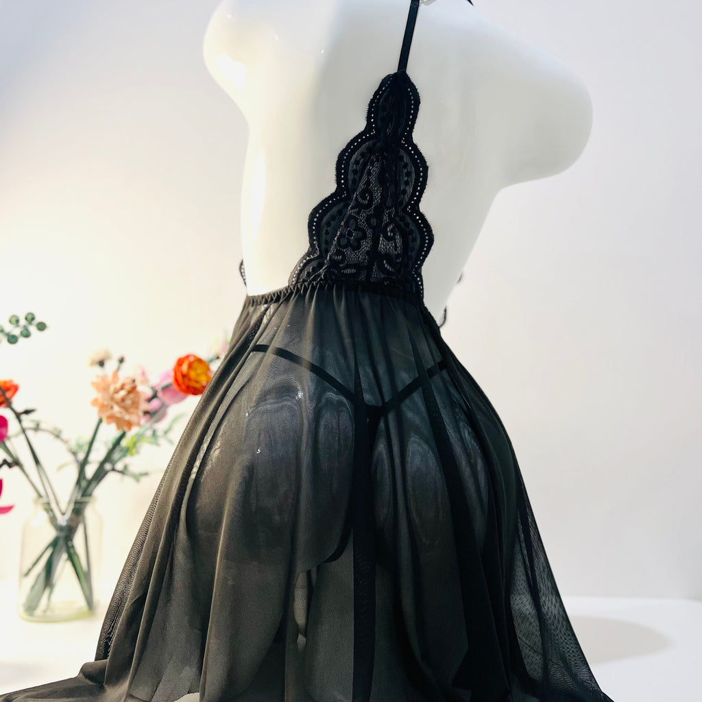 black lace sleep dress back view highlighting thong fit and smooth silhouette design