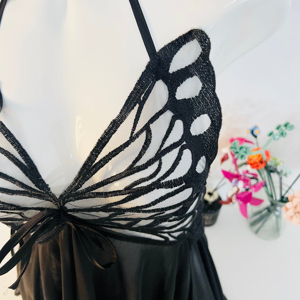 lace detail on bust area of black sleep dress showing delicate texture and shape