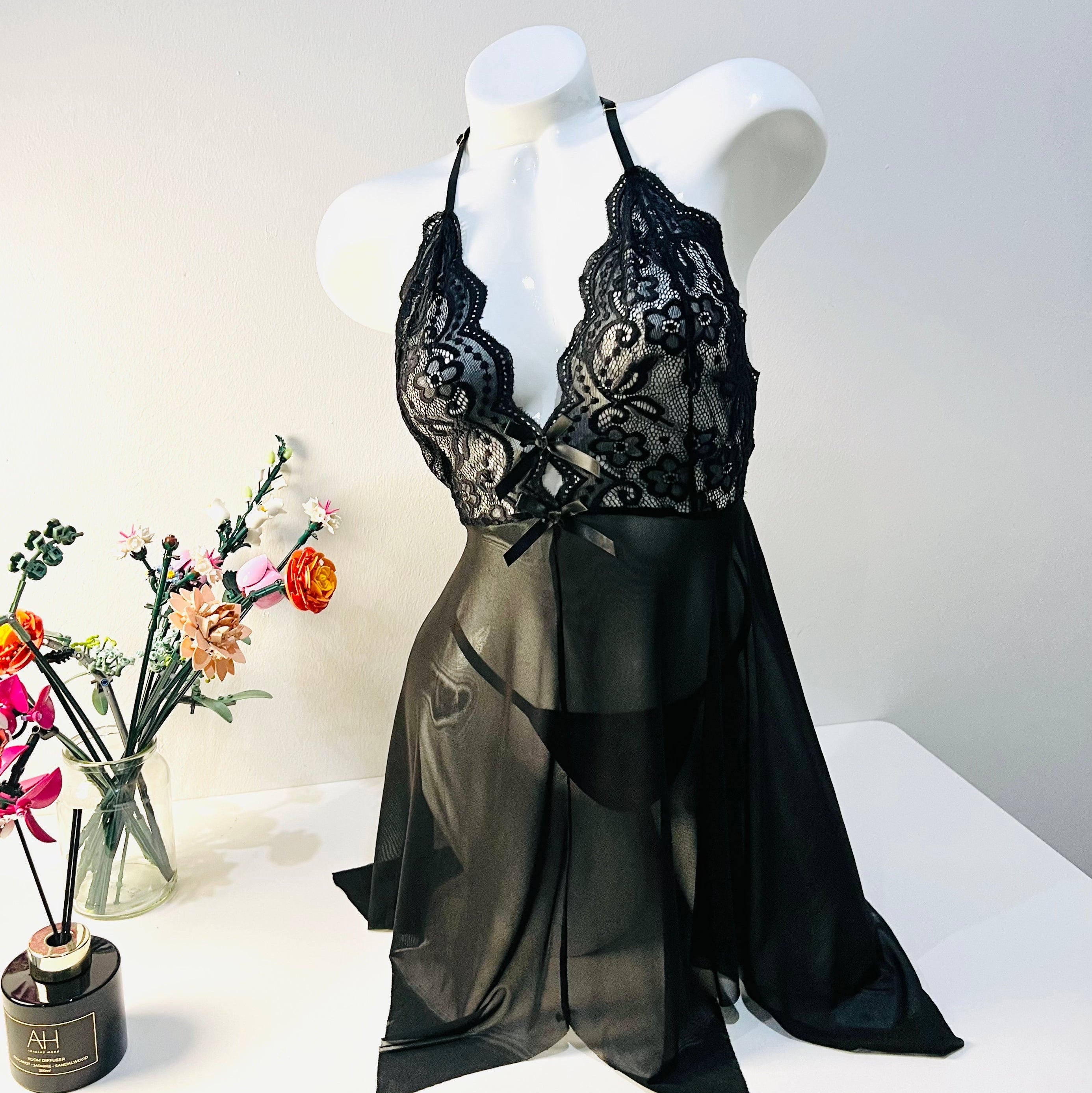 black lace sleep dress worn by model front view elegant soft lingerie silhouette