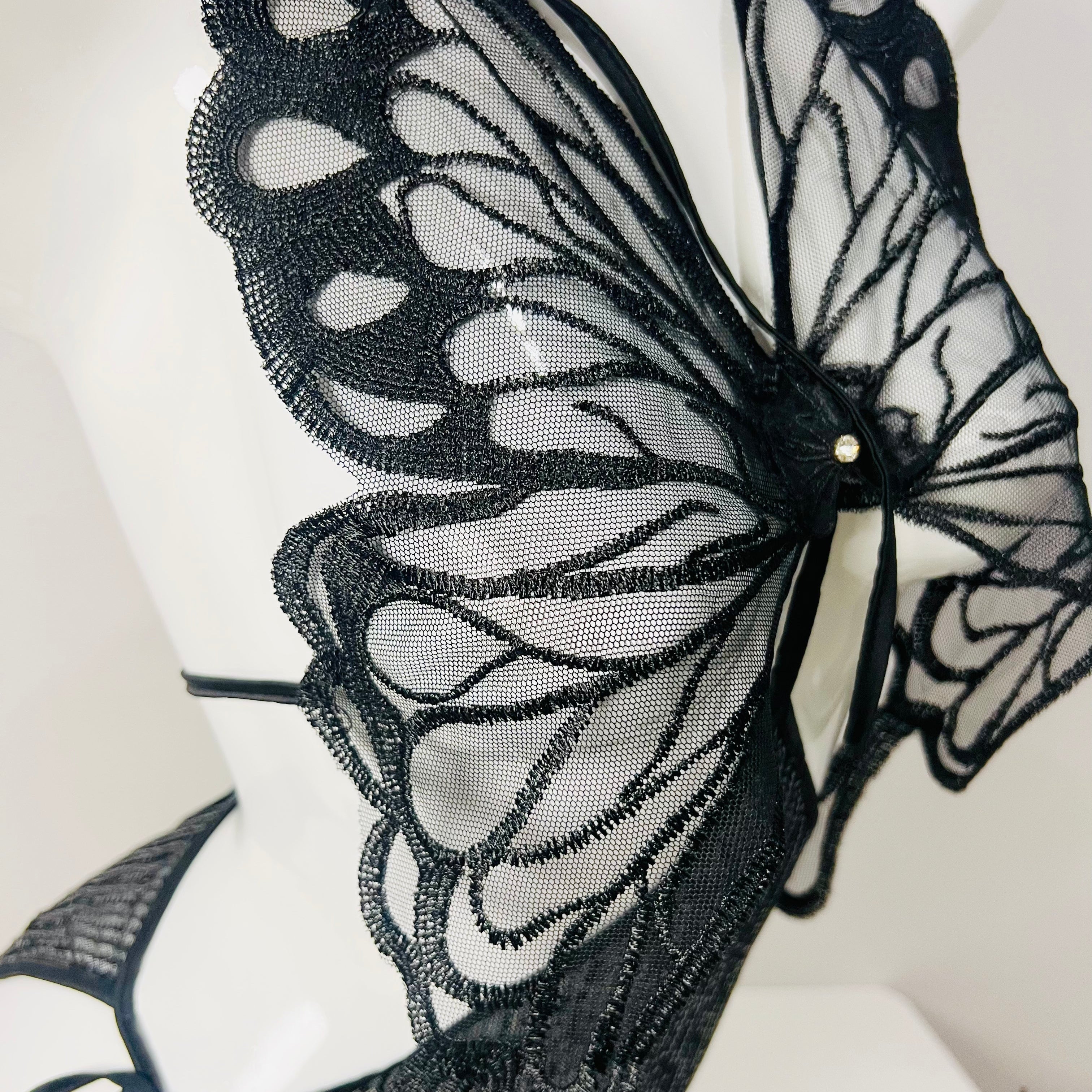 black lace strappy sleep dress bust detail close up lace embroidery design