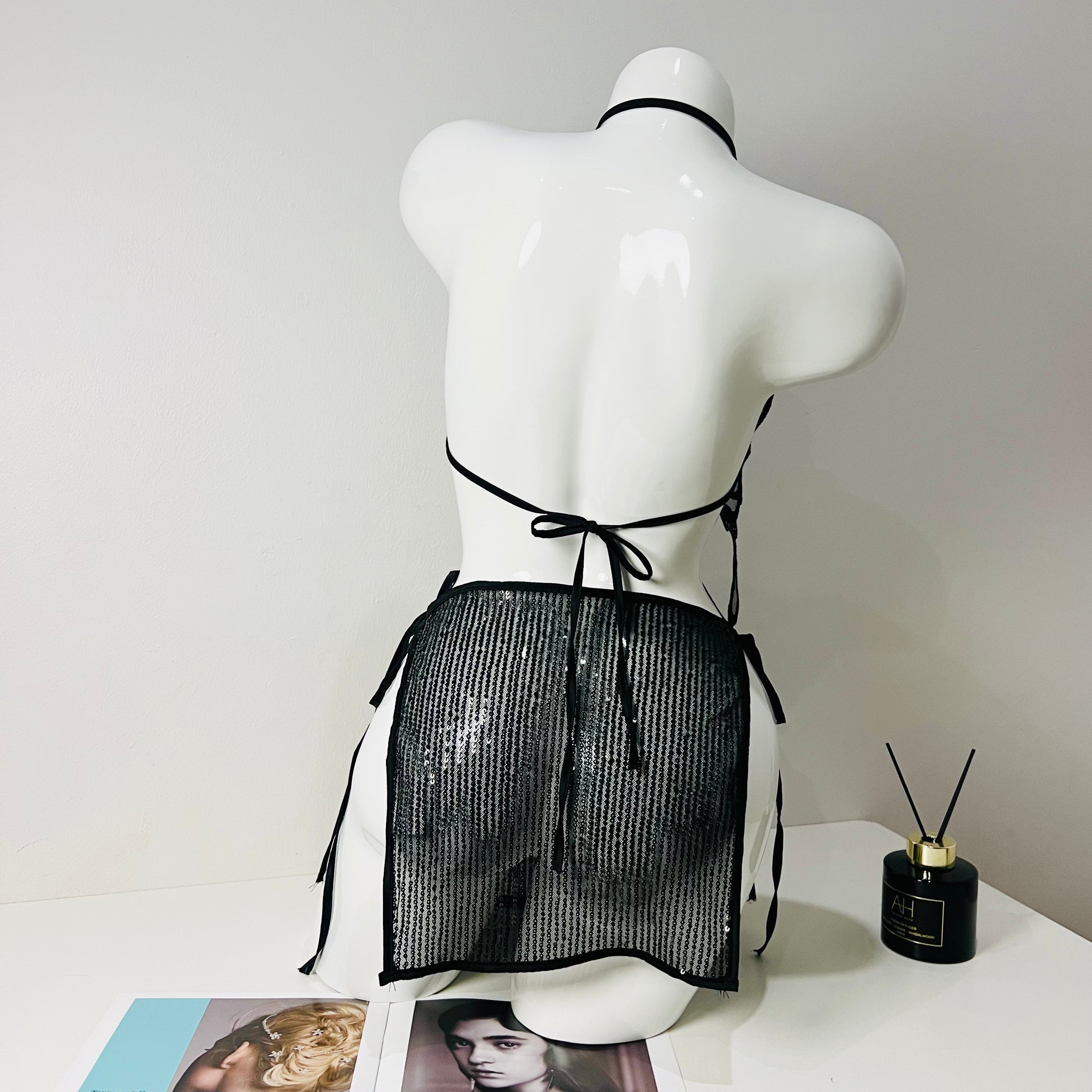 black lace strappy sleep dress back view model wearing adjustable strap nightgown