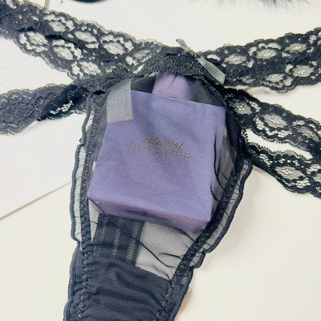 black lace thong lingerie fabric close up texture detail