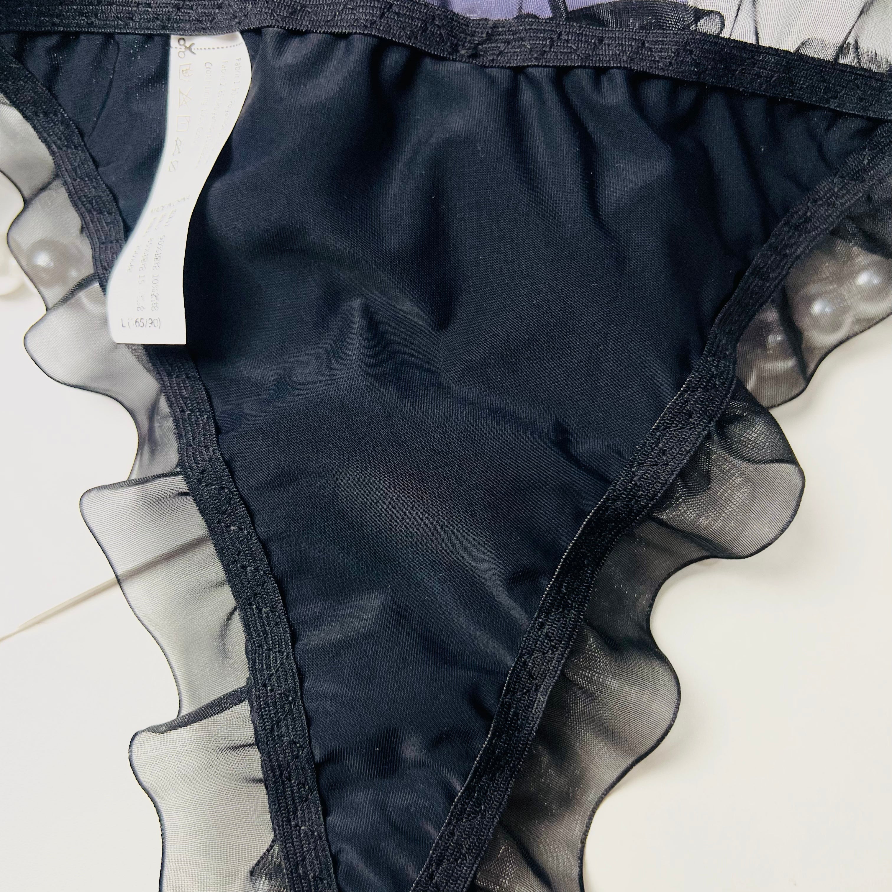 black pearl bow thong lingerie inner fabric close up stitching detail