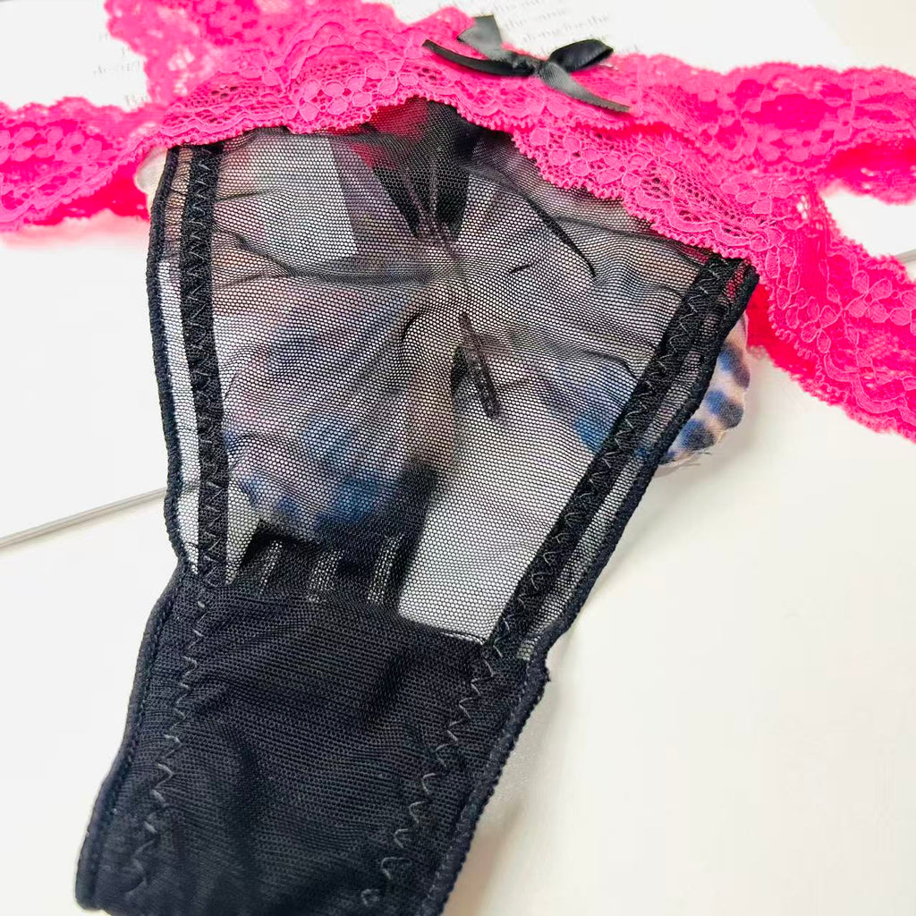 black rose lace thong lingerie fabric close up texture detail