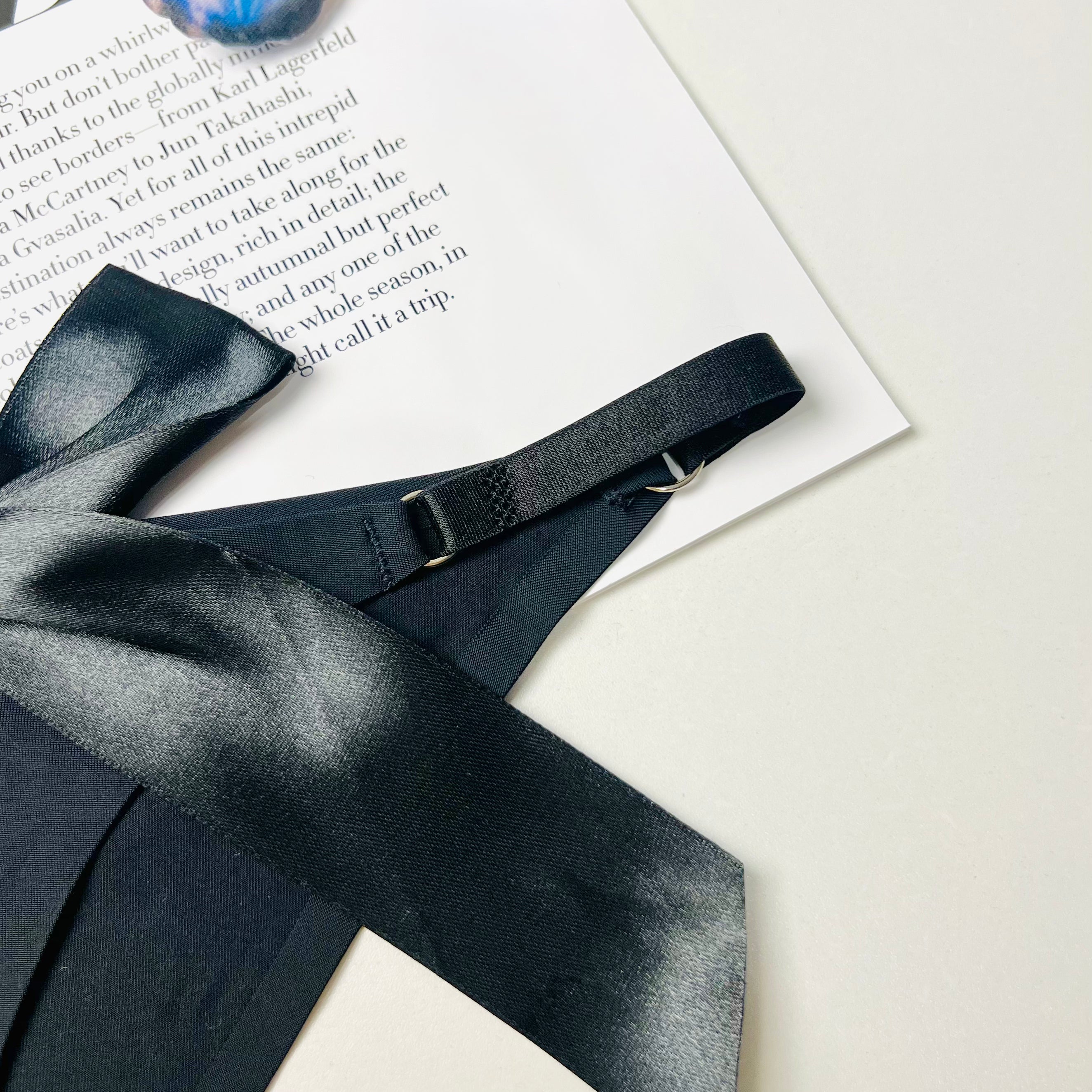 black silk bow thong lingerie stitching detail close up design