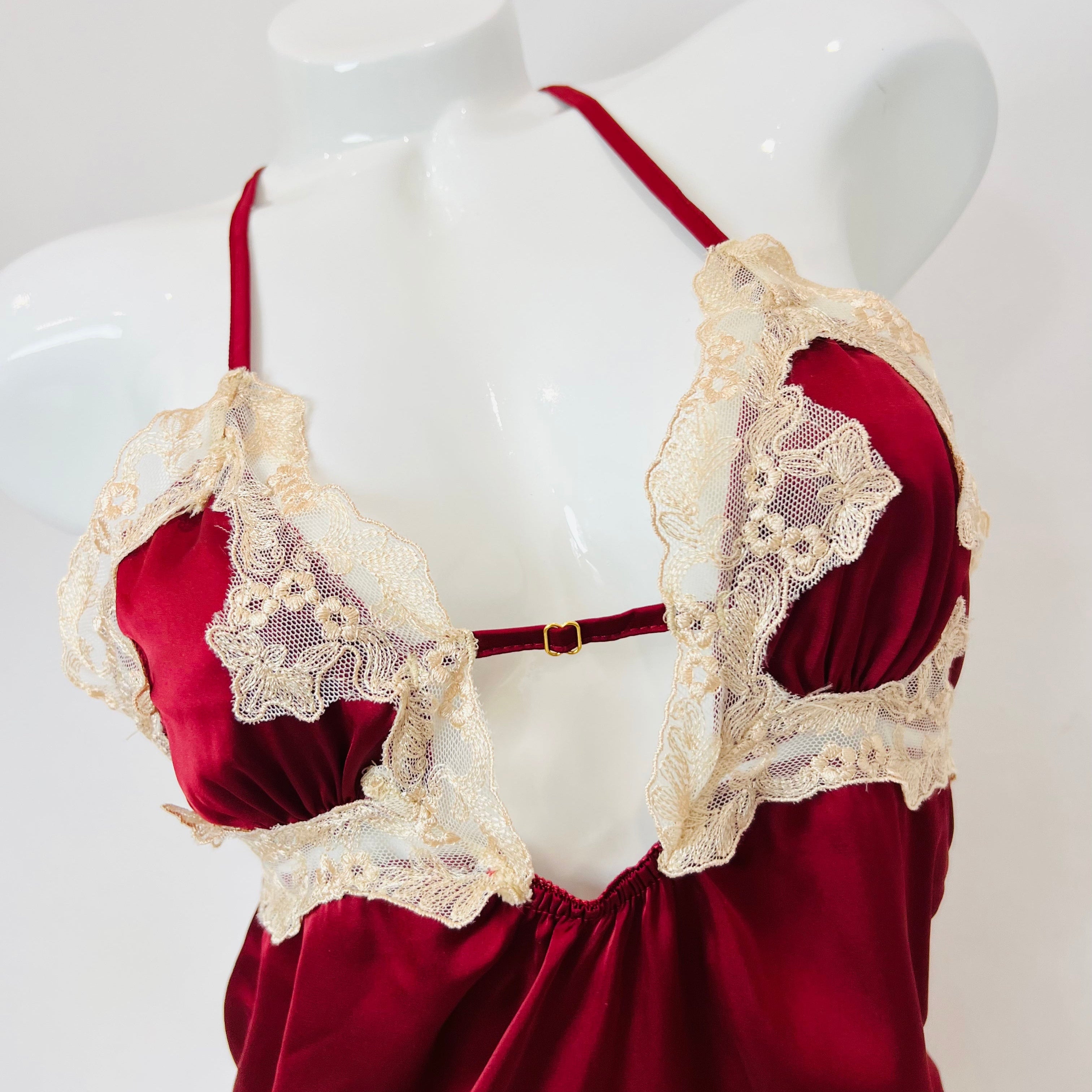 burgundy lace slip dress bust detail close up lace embroidery texture