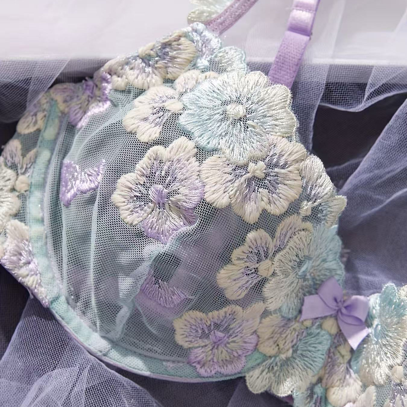 soft pastel lace bra lingerie close up detail craftsmanship stitching