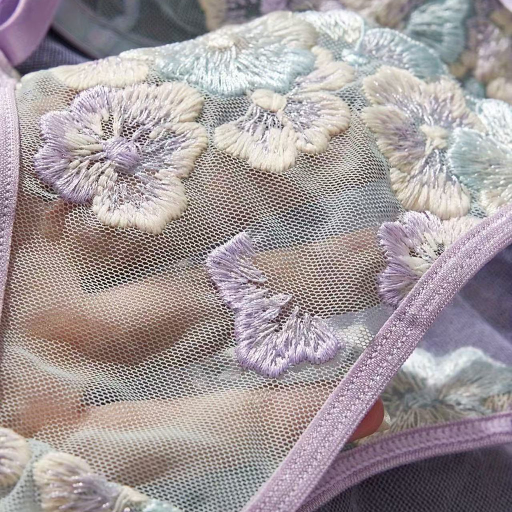 soft pastel lace thong lingerie close up detail fabric texture