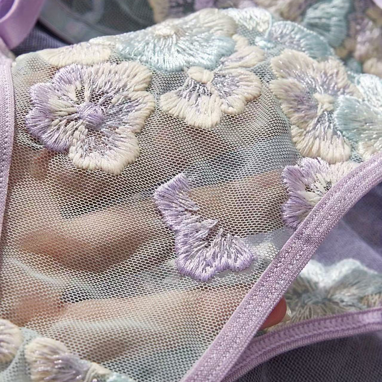 soft pastel lace thong lingerie close up detail fabric texture
