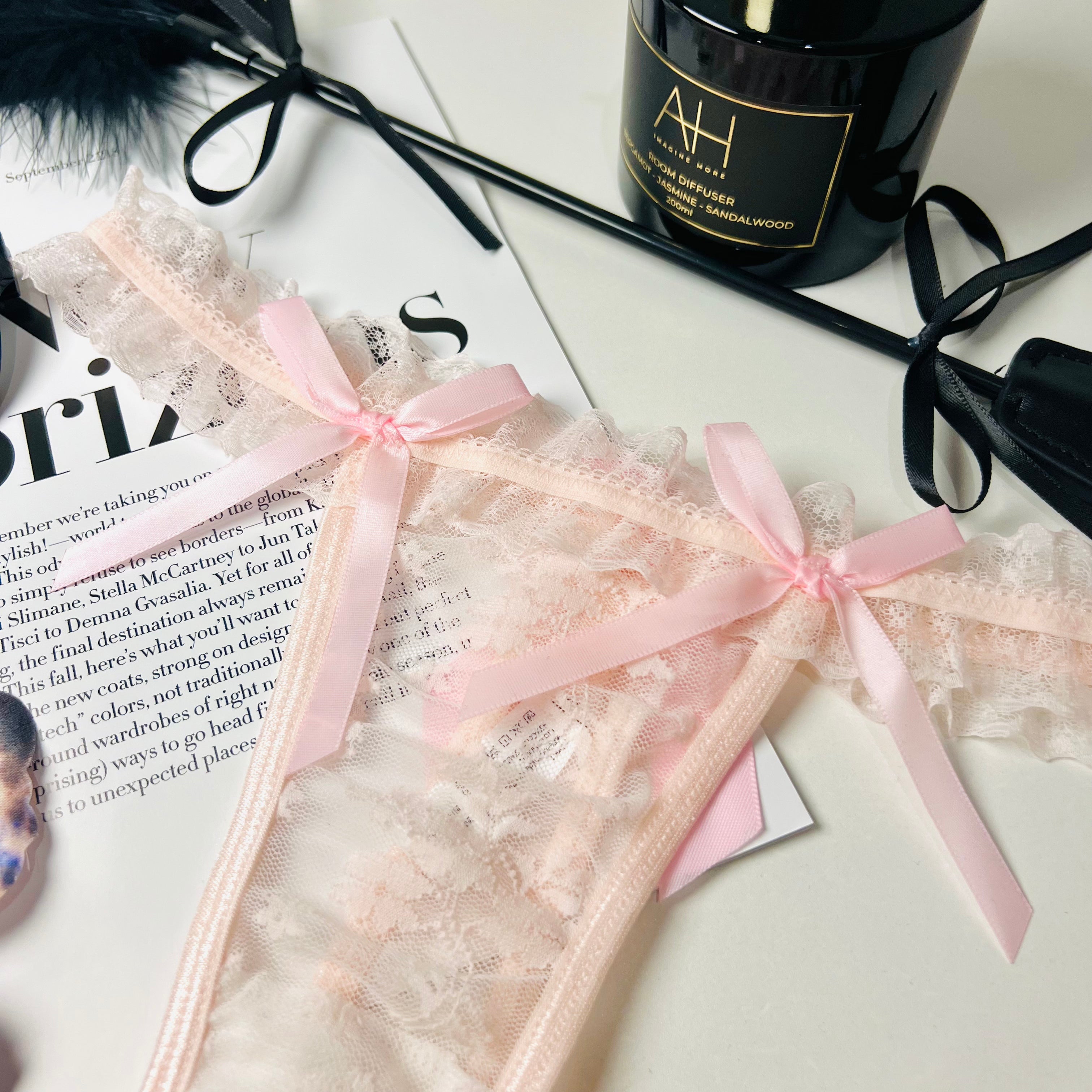 pink lace bow thong lingerie front bow detail close up