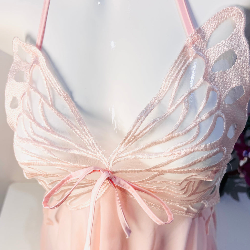 lace detail on bust area of pink sleep dress showing soft texture and feminine shape