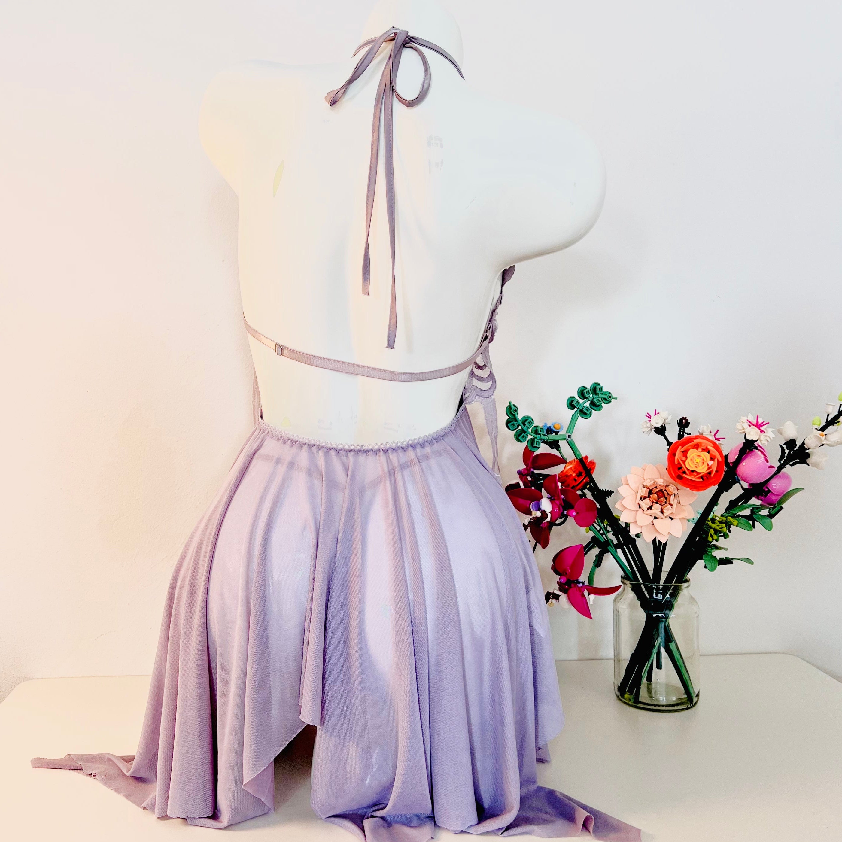 purple lace sleep dress back view highlighting thong fit and smooth back design