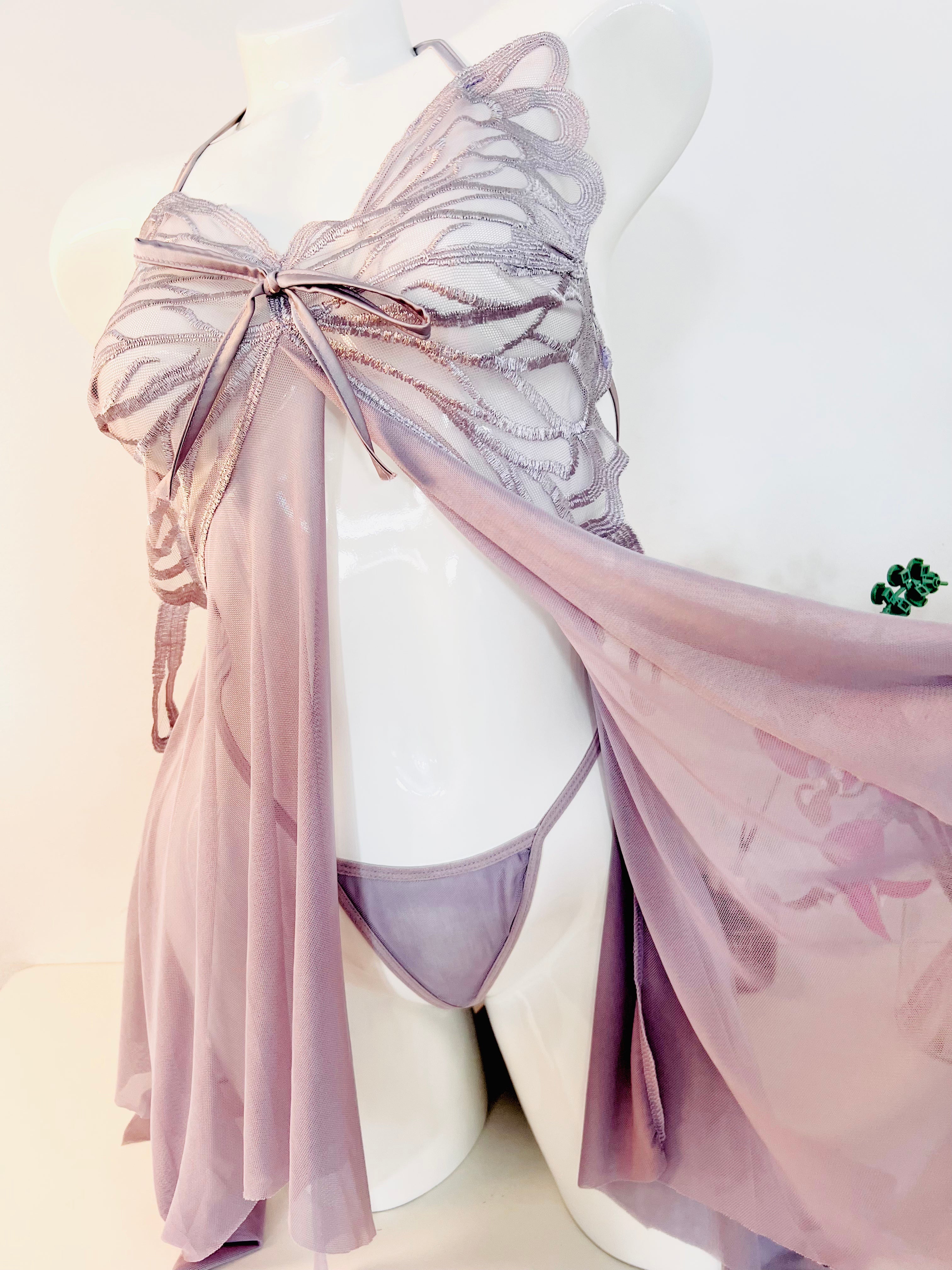 side slit detail on purple lace sleep dress showing movement and design feature