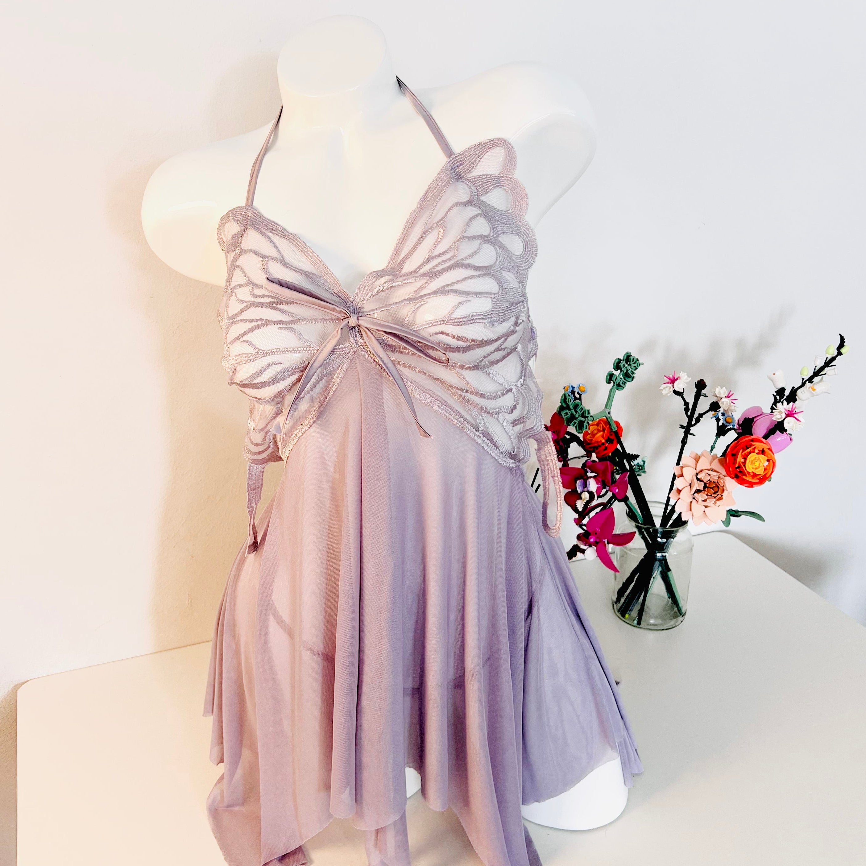 purple lace sleep dress worn by model front view soft and romantic lingerie look