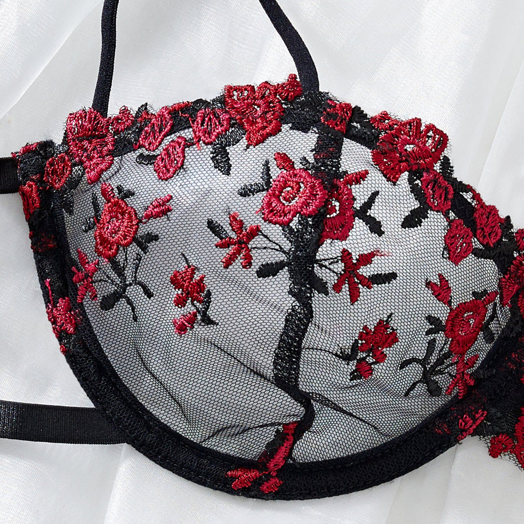 red embroidery lace fabric close up texture detail