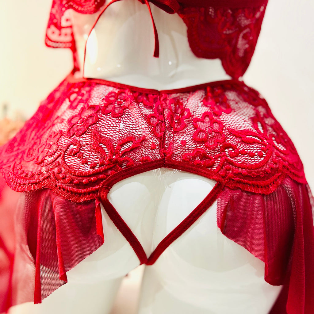 back cut design of red lace bodysuit highlighting shape and contour fit