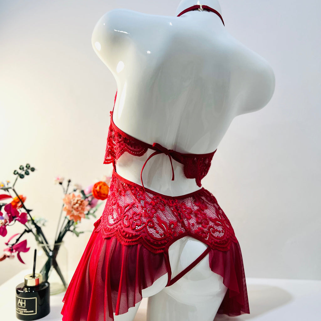 red lace bodysuit back view showing sheer design and defined silhouette