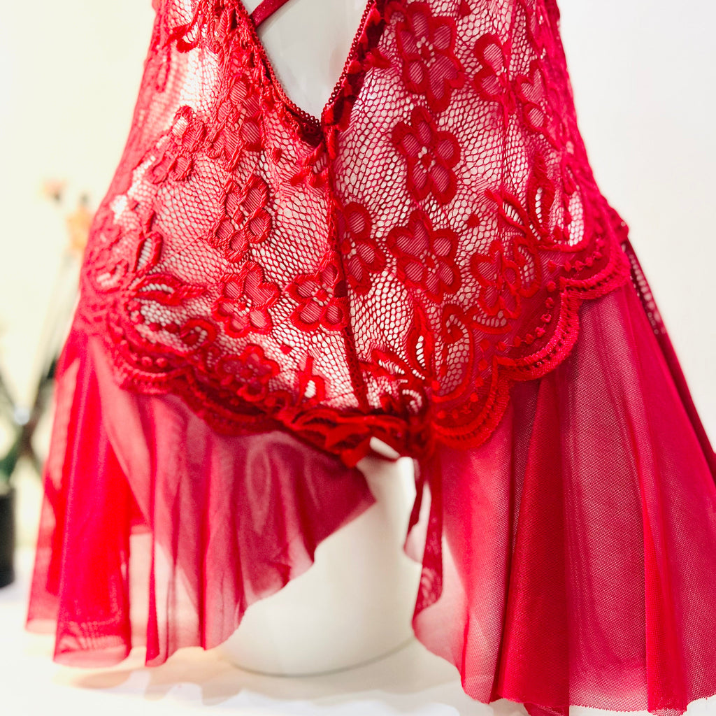 lace edge detail of red bodysuit showing soft finish and delicate pattern