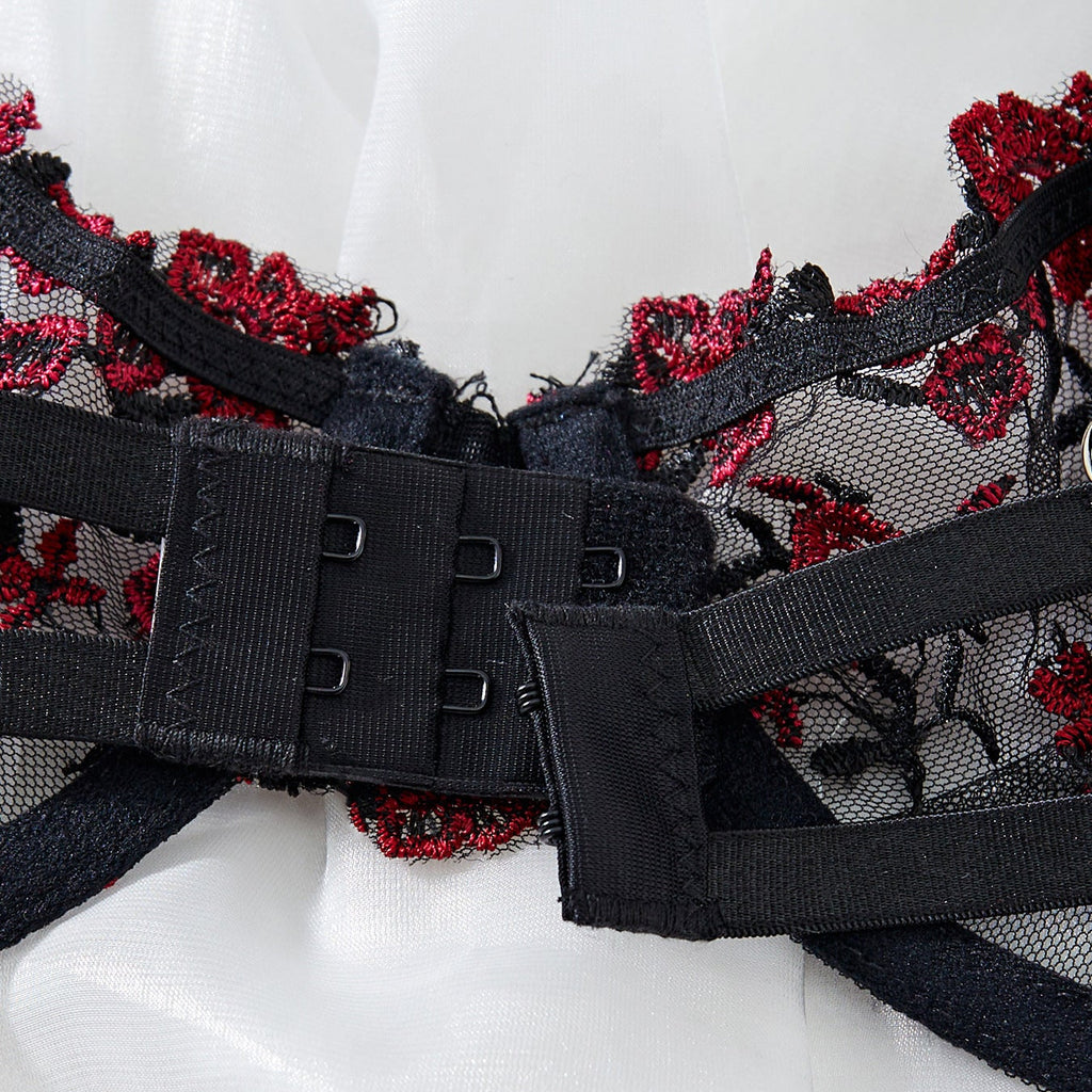 red lace lingerie bra clasp closure detail close up