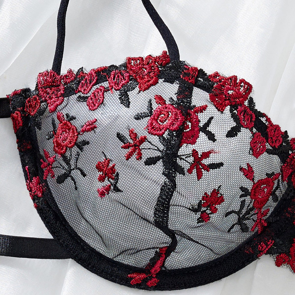red lace lingerie stitching craftsmanship close up detail